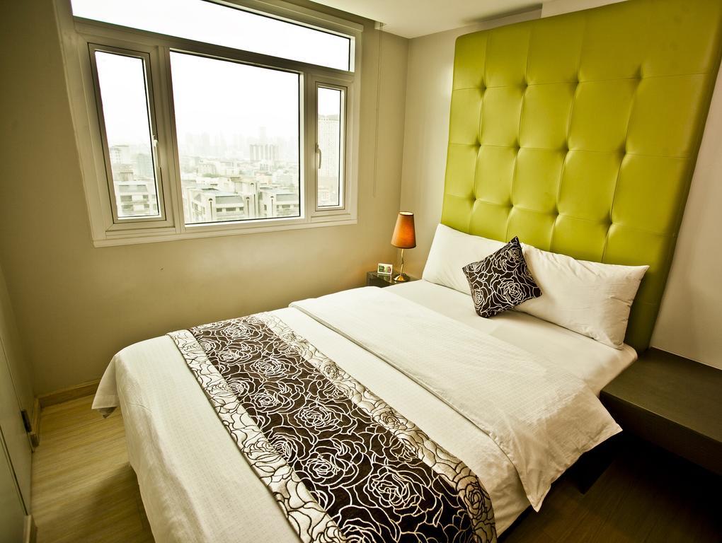 The Exchange Regency Residence Hotel Managed By Hii Pasig City Værelse billede